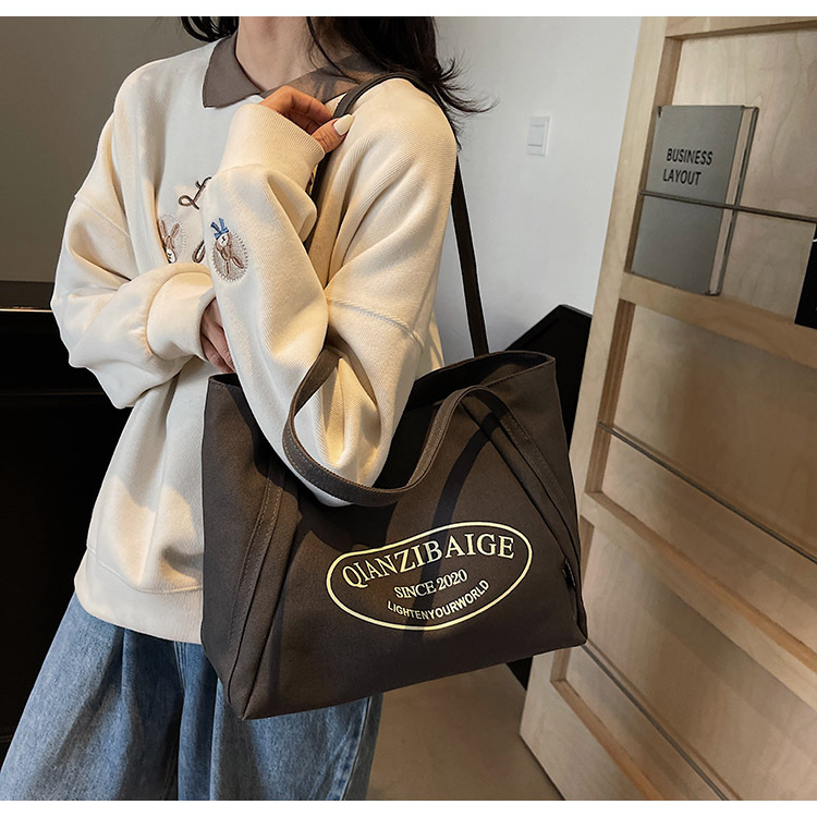 2020 New Korean-style niche retro laid-back tote bag, large-capacity single-shoulder crossbody bag, office commuting underarm bag details Picture
