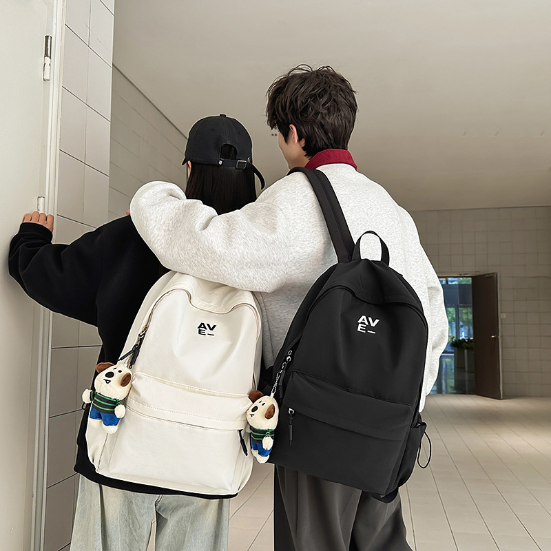 Korean version couple simple large-capacity backpack, casual commuting college student schoolbag, niche lightweight travel backpack details Picture