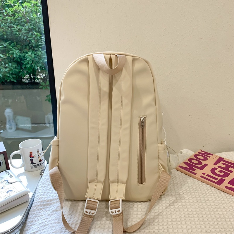 A fresh and artistic girl's backpack for junior and senior high school students in solid color, lightweight and versatile, large-capacity backpack Specification drawing