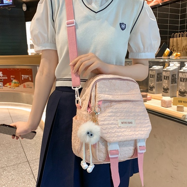 Japanese-style Instagram sweet girl travel mini backpack with high appearance level bubble grid cream series children's study backpack details Picture