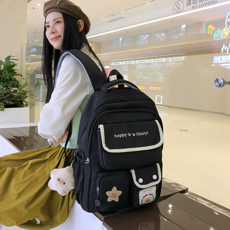 Wholesale of pure color backpacks for female junior high school students with a fresh and simple Korean school style and multi-layered design Specification drawing