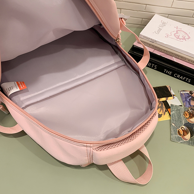 The new summer milk tea college style schoolbag has a high appearance level and contrasting colors. It is a multi-layered backpack for primary and secondary school students in grades three and six Application Scenario