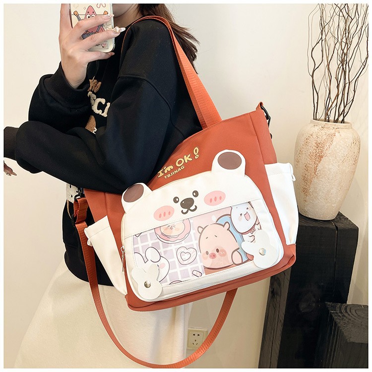 2025 New cute large-capacity commuter student tutorial bag, cartoon simple crossbody bag, high appearance level single-shoulder bag full figure