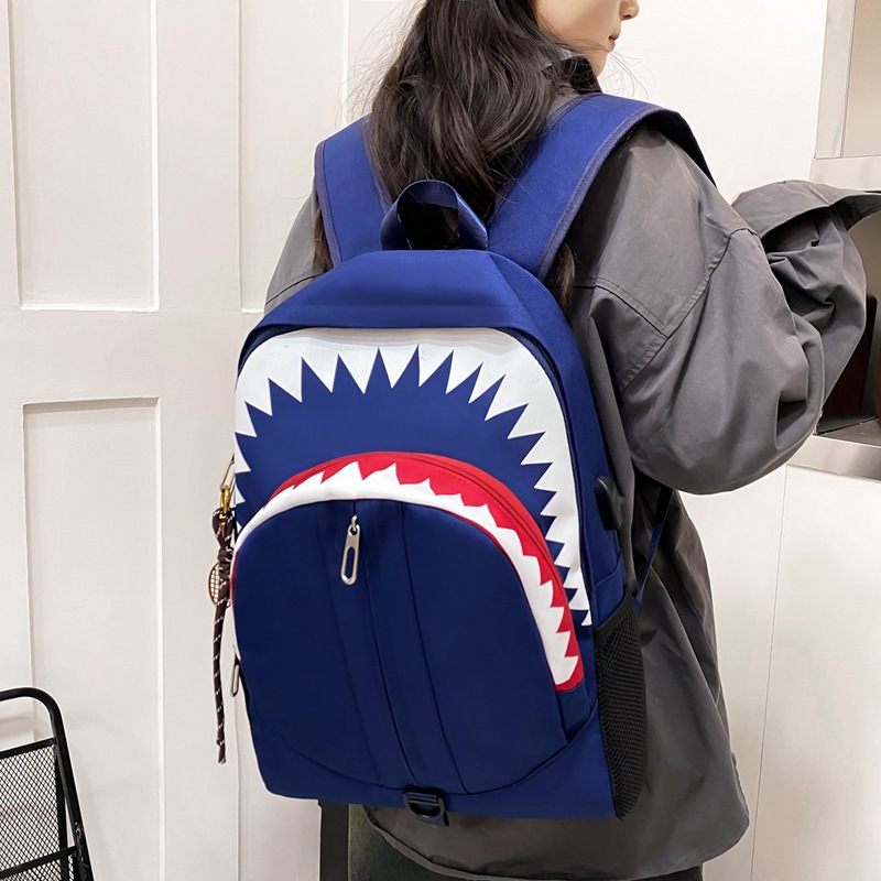 The new shark glow-in-the-dark and funny backpack is fashionable and versatile. It is a large-capacity, trendy and cool travel and casual backpack for students details Picture