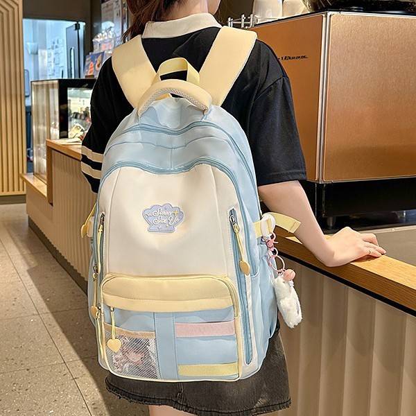 A new Japanese-style ins backpack with a high level of appearance, fresh and sweet, featuring a color-blocking and color-blocking design. It is a lightweight backpack for junior and senior high school students details Picture