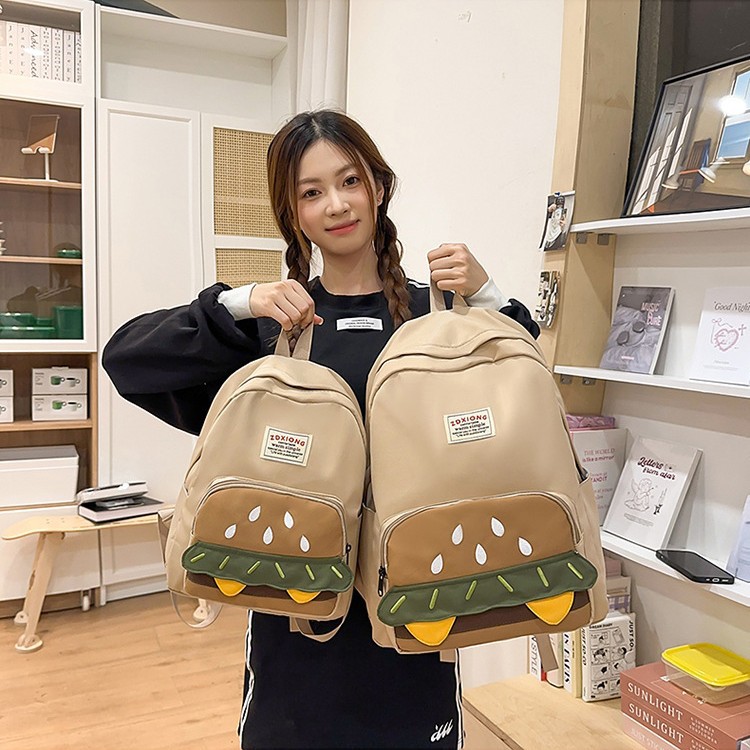 ins Burger's cute and unique design schoolbag is cartoonish and versatile. It's a lightweight travel backpack for college students and a casual backpack details Picture