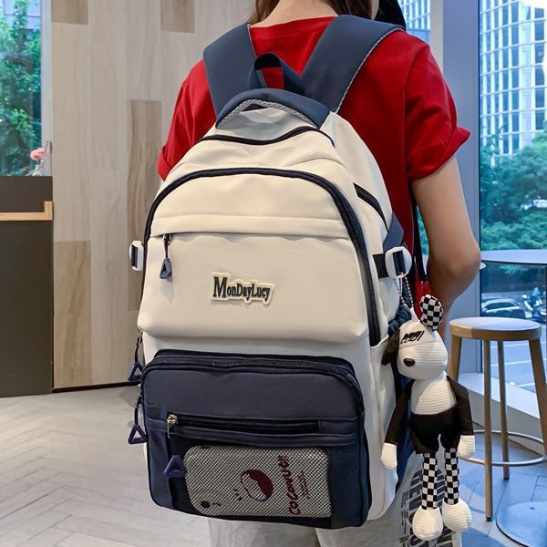 High-appearance-level Japanese-style schoolbag with contrasting colors, lightweight backpack for junior and senior high school students, 2023 new large-capacity couple backpack details Picture