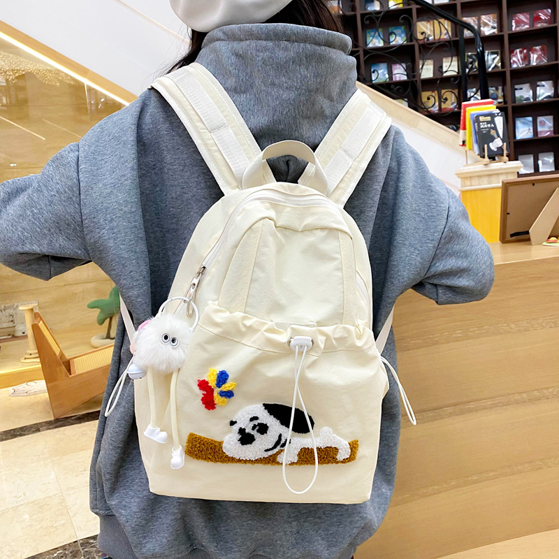 Korean Ins-style cute puppy backpack, a fresh and versatile backpack for girls, a large-capacity drawstring spring outing backpack details Picture