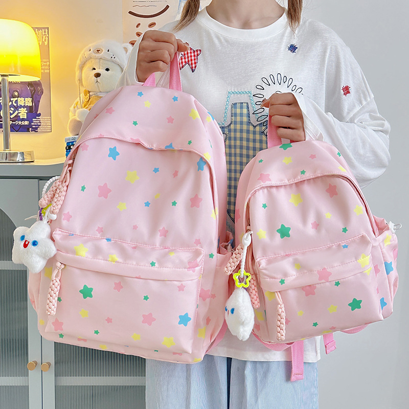 A new high-appearance-level, fresh and sweet, colorful star-shaped backpack from Japanese Instagram, a large-capacity backpack for junior and senior high school students full figure