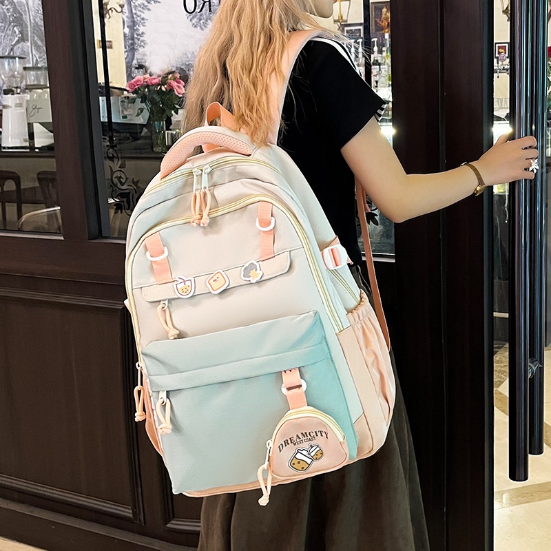 A new high-appeal, fresh and college-style backpack from Korean Instagram, featuring color-blocking and large-capacity backpacks for junior and senior high school students details Picture