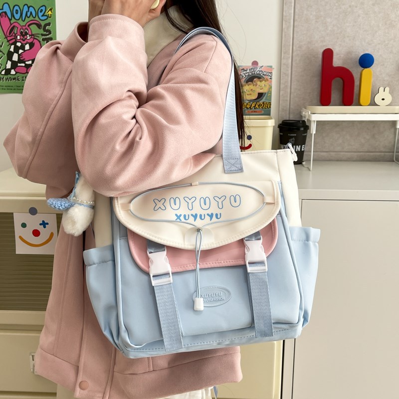 A high-appeartion-level Japanese school-style crossbody bag, a casual bag for female students' classes, a large-capacity hand-held tutorial bag, and a commuting bag full figure