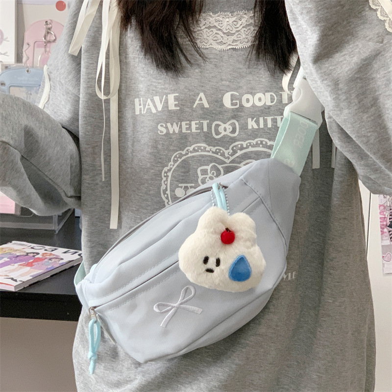 The 2025 new style of fresh and light bow chest bag with an ins style, a lightweight student waist bag with a forest style, and a niche crossbody bag details Picture