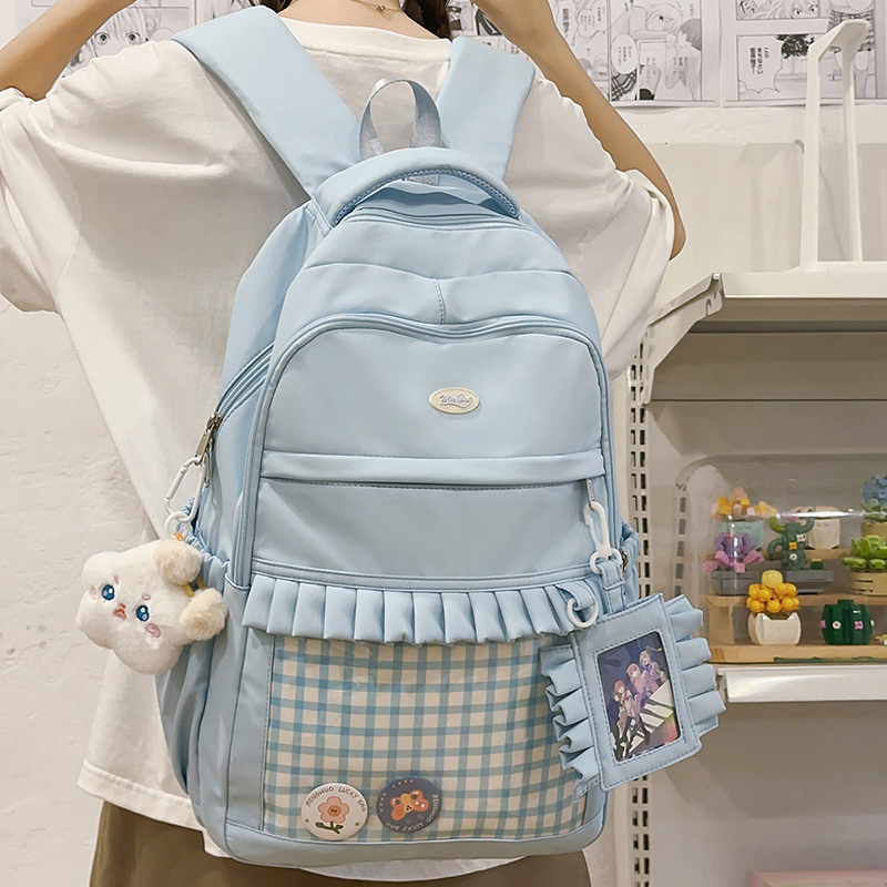 A new Japanese-style high-appearance-level, fresh and sweet 2D "smug pain bag" for girls, a large-capacity backpack for junior and senior high school students full figure