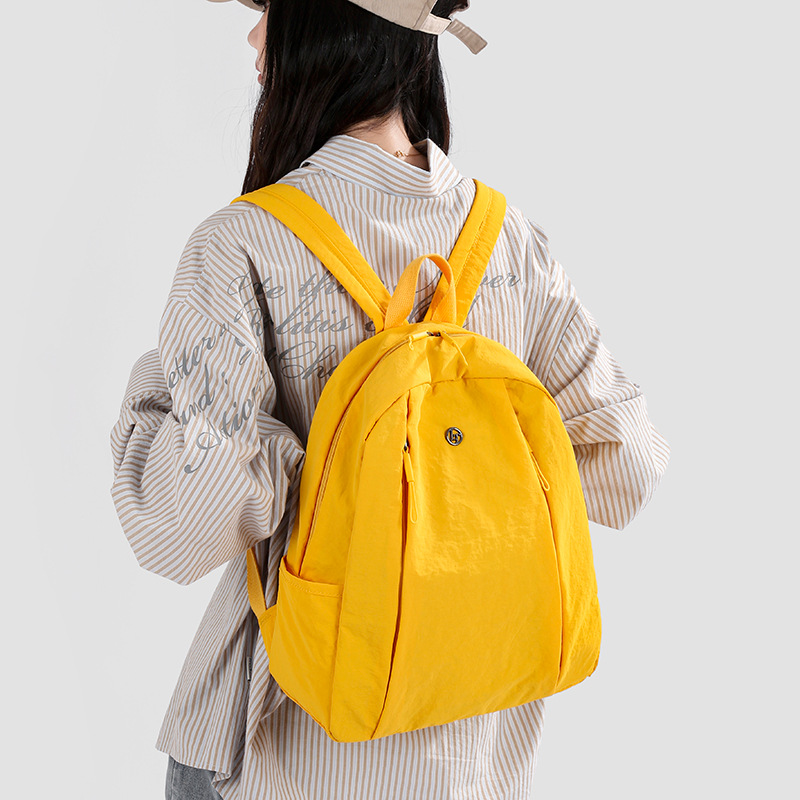 The new forest-themed backpack with a high level of appearance and fresh candy color will charm you. It's a lightweight backpack for women's short trips, mountain climbing and tourism full figure