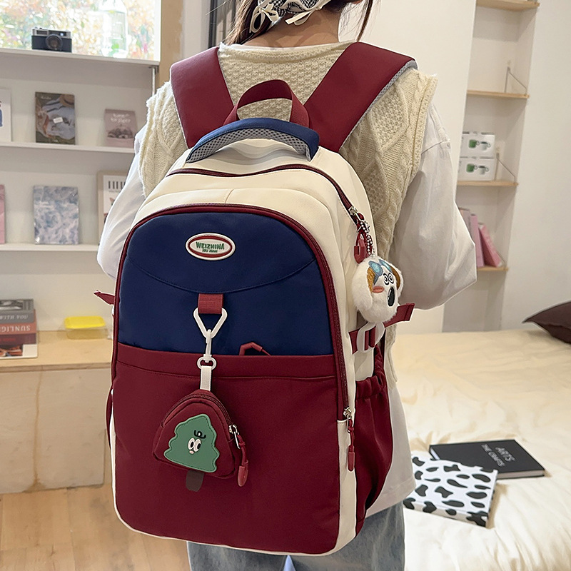 High-quality, large-capacity, Korean-style color-blocking schoolbag for junior and senior high school students, high appearance level, spine support backpack, casual and versatile backpack details Picture