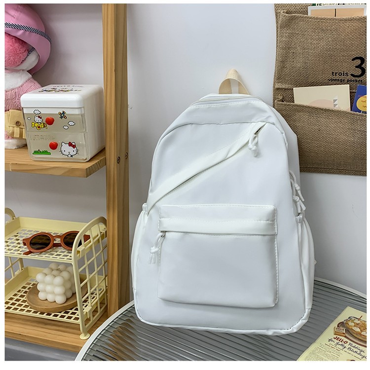 The new forest-themed solid color is simple and versatile. It is a large-capacity, lightweight backpack for junior high school, senior high school and college students Application Scenario