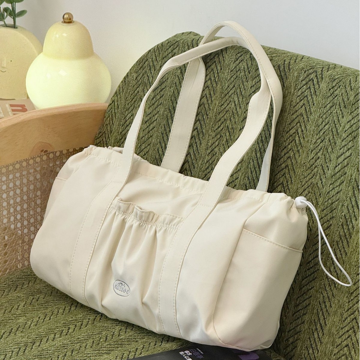 Korean casual niche pleated drawstring versatile hand-held square tote bag, single-shoulder crossbody underarm bag, travel bag Application Scenario
