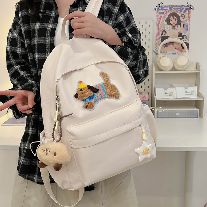 2024 New cute and cute cartoon dog backpack for women, Korean-style schoolbag, commuting backpack for classes details Picture