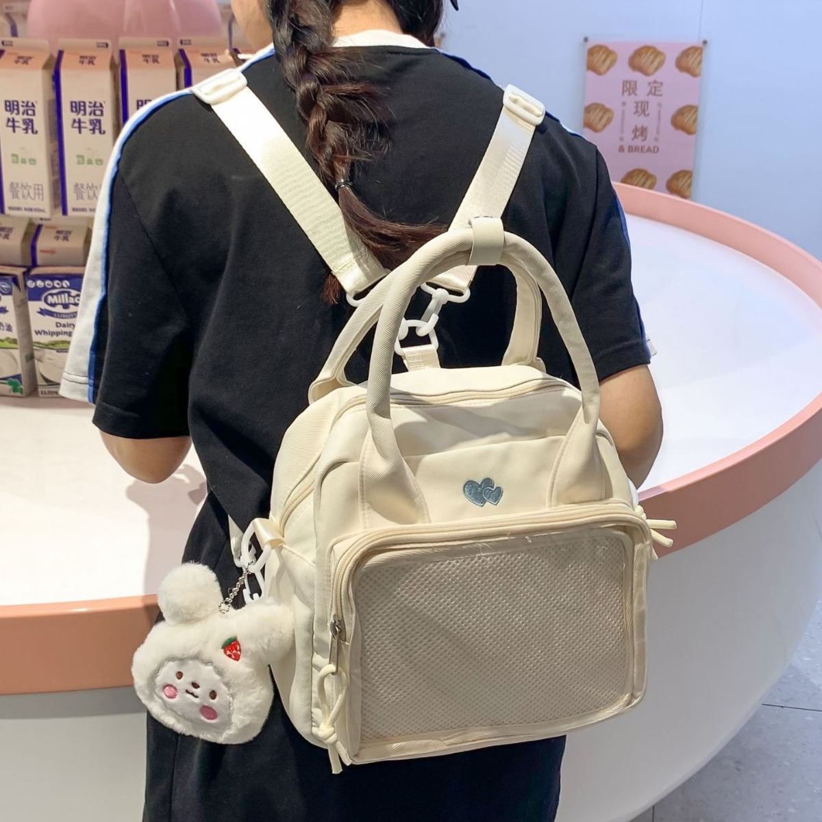 2024 New Japanese-style cute sporty transparent crossbody bag, women's fashion versatile, high appearance level backpack, hand-held pain bag full figure