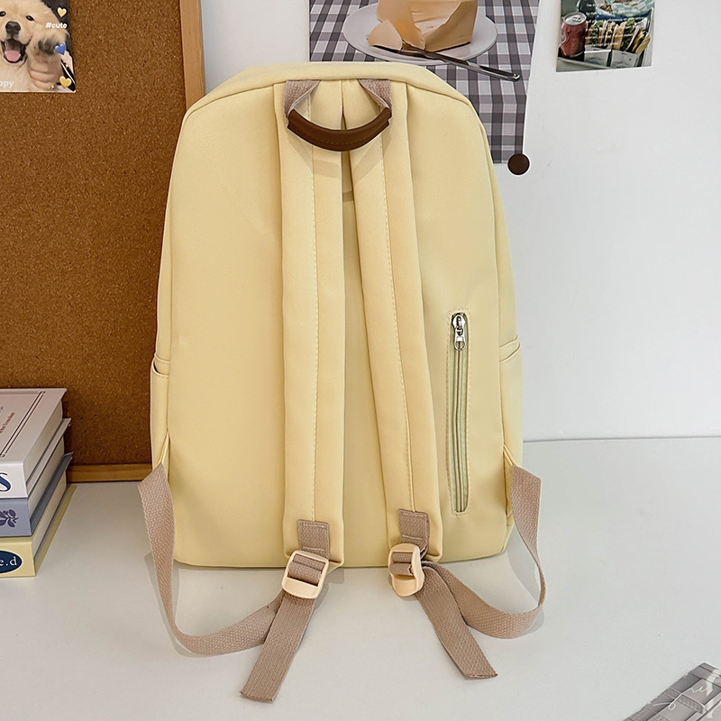 The new Korean-style backpack for women is a versatile solid-color schoolbag with a simple and niche ins style. It is a lightweight and casual backpack for college students Specification drawing