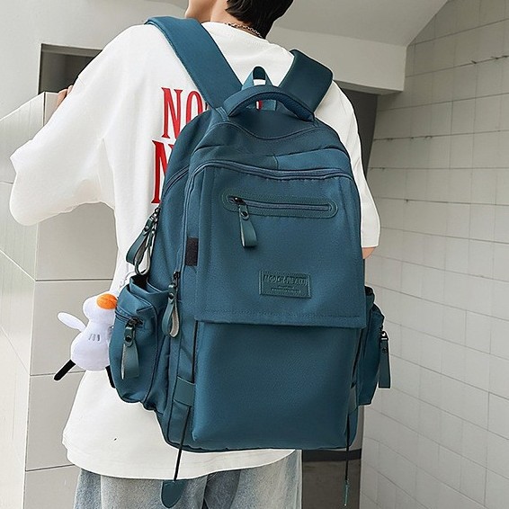 A new high-appeal, fresh solid color, niche and individual backpack from Korean Instagram, a simple and lightweight travel backpack for couples details Picture