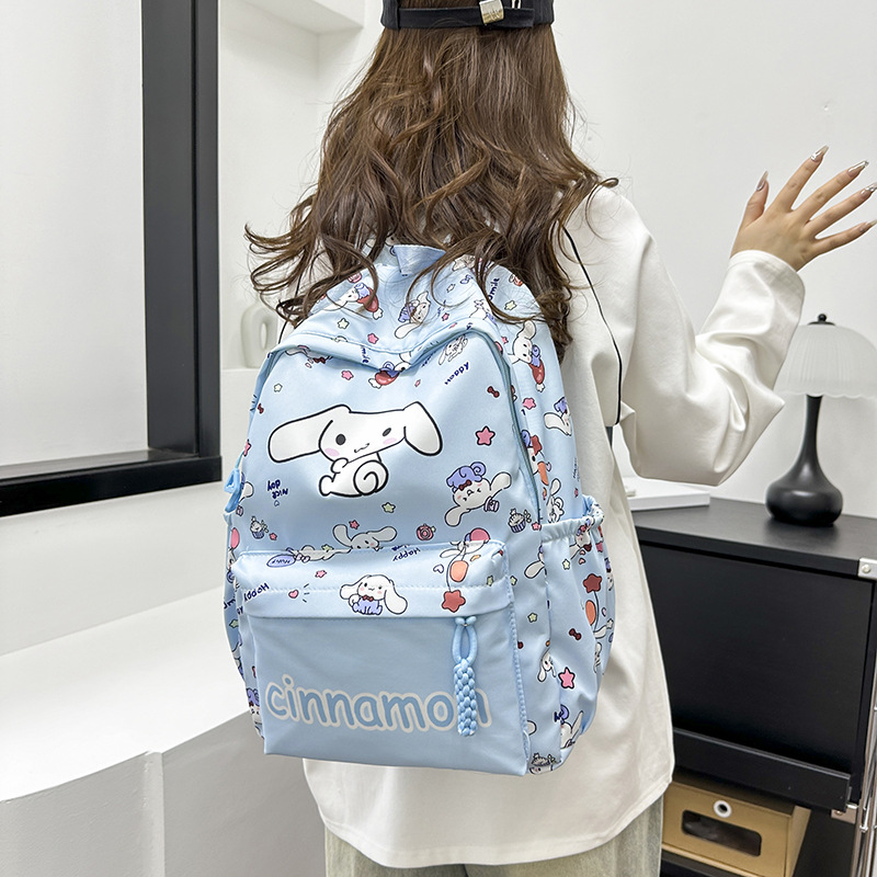 Cartoon printed back support schoolbag for grades 3-6, lightweight, waterproof and cute children's schoolbag, large-capacity backpack for college girls Application Scenario