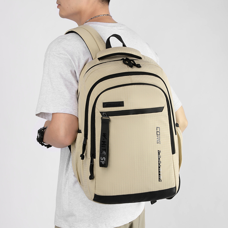 The new boys' multi-layered schoolbag for junior and senior high school students is a versatile and stress-reducing backpack for the campus and a casual backpack for the back-to-school season details Picture