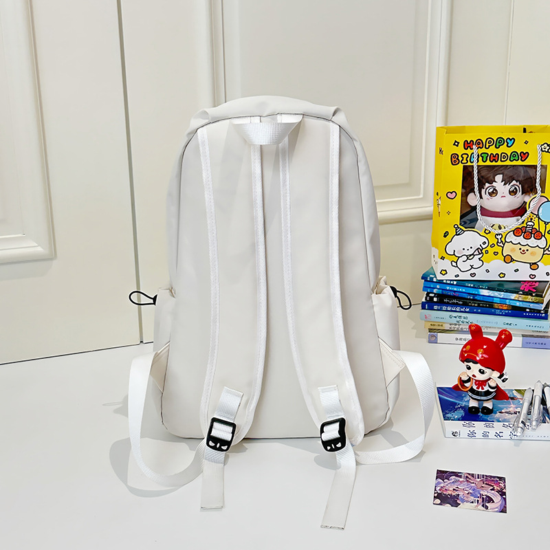 Forest-themed, high-appearancelevel, large-capacity, simple and solid-color college student schoolbag, versatile, casual and portable backpack for travel Application Scenario