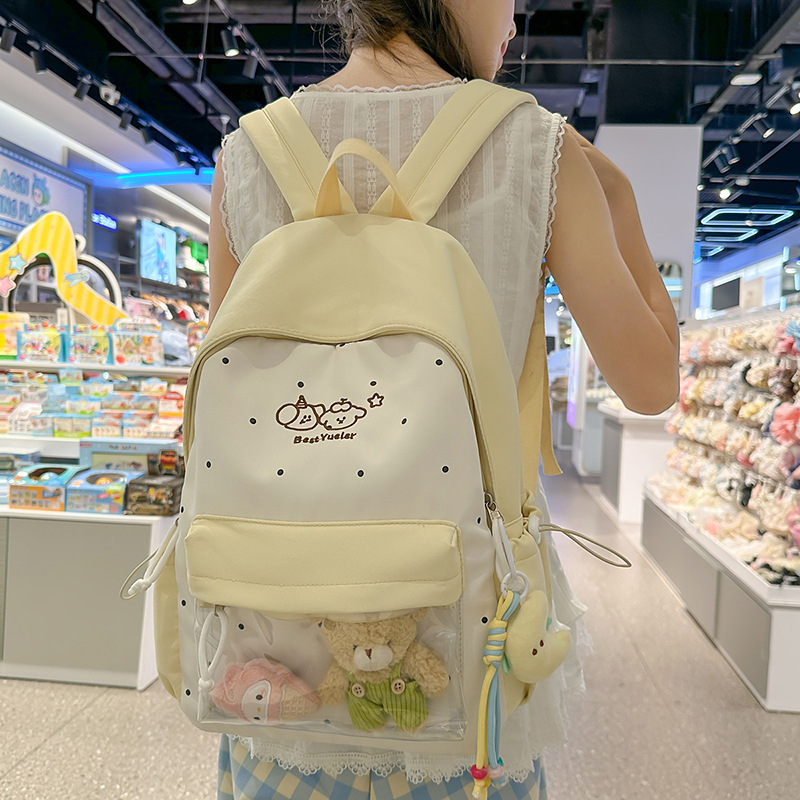 A new high-appeal, fresh and sweet candy-colored dopamine cute cartoon backpack, a lightweight backpack for junior and senior high school students full figure