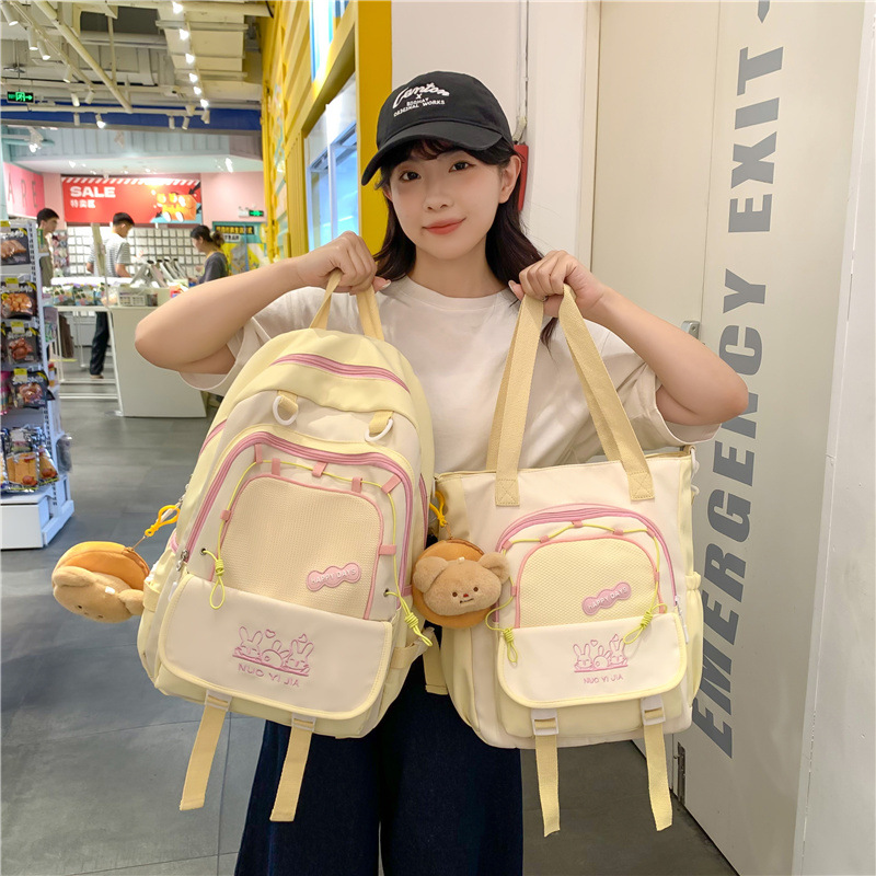 A cute two-piece backpack set of forest style for middle school students from grades three to six with a Japanese and Korean ins school style color contrast details Picture
