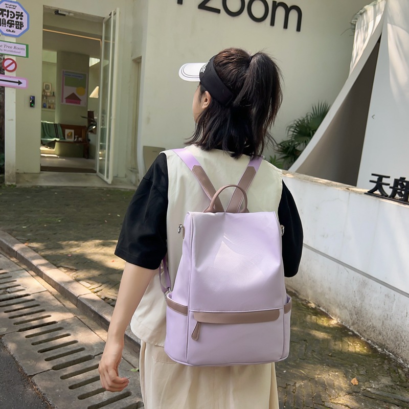 2025 New anti-theft design versatile backpack, Japanese ins commuting backpack, simple and casual large-capacity schoolbag full figure