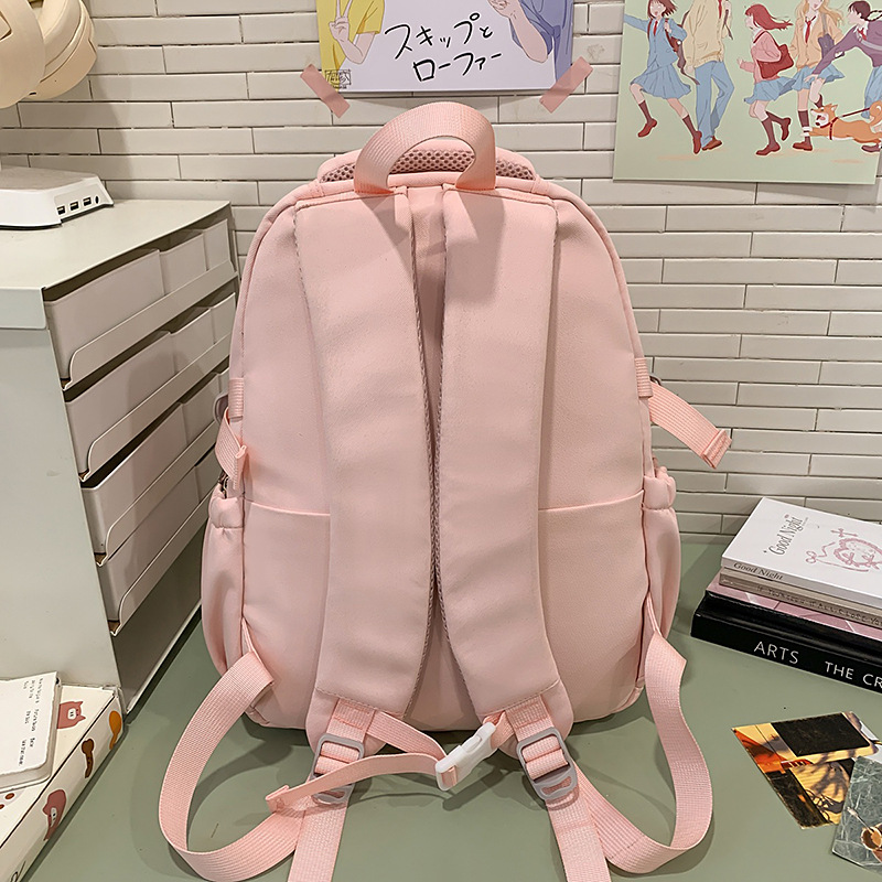 The new summer milk tea college style schoolbag has a high appearance level and contrasting colors. It is a multi-layered backpack for primary and secondary school students in grades three and six Specification drawing