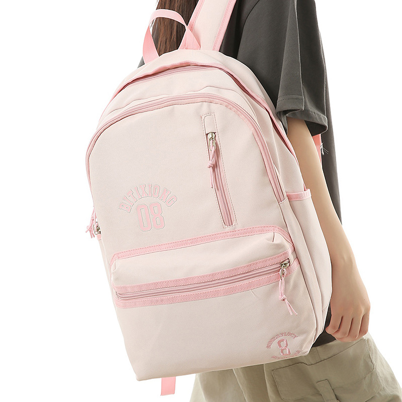 The new Korean version of the high-appearance-level letter schoolbag for junior and senior high school girls is simple, lightweight and versatile for commuting. It has a large capacity backpack full figure