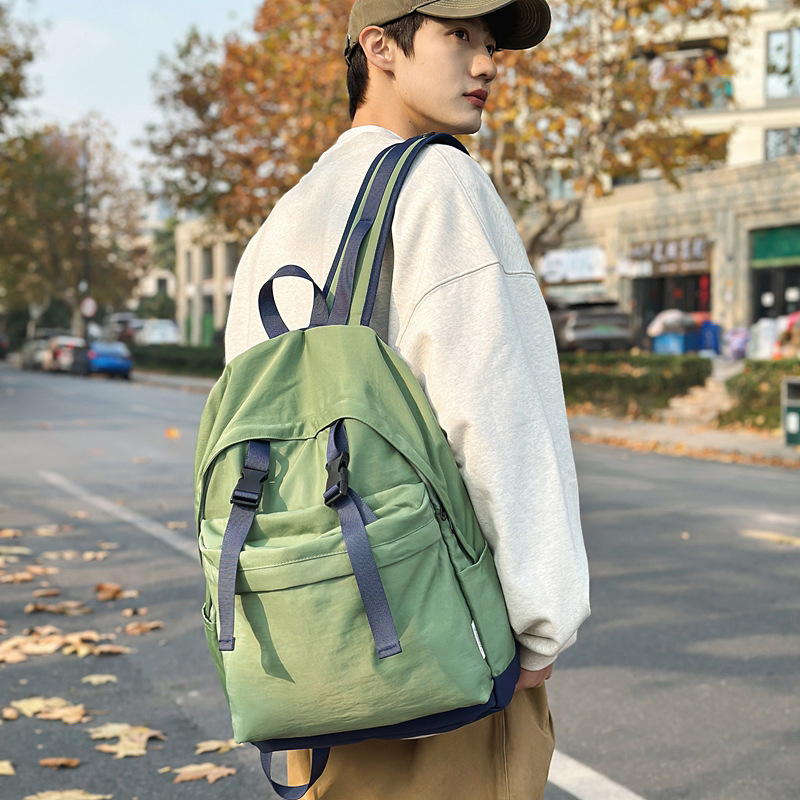 Lightweight, simple and solid-color backpack, casual and versatile. It's a school bag for high school students and a travel backpack for college students and couples details Picture