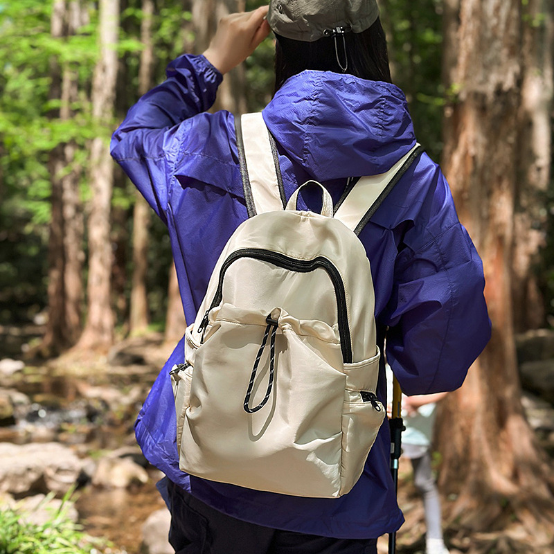 A new multi-purpose travel backpack for both men and women with a high aesthetic level. A Korean version of Instagram multi-pocket drawstring backpack with large capacity details Picture