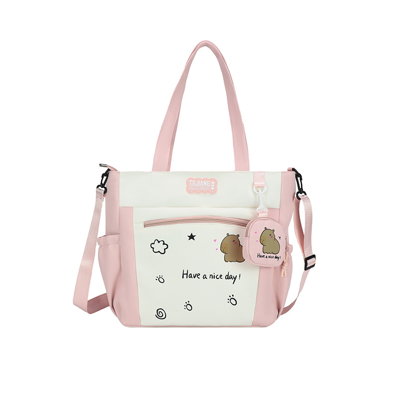 Large-capacity cartoon school-style single-shoulder bag for female primary school students to carry books for class tutoring. High appearance level student crossbody bag Item Picture