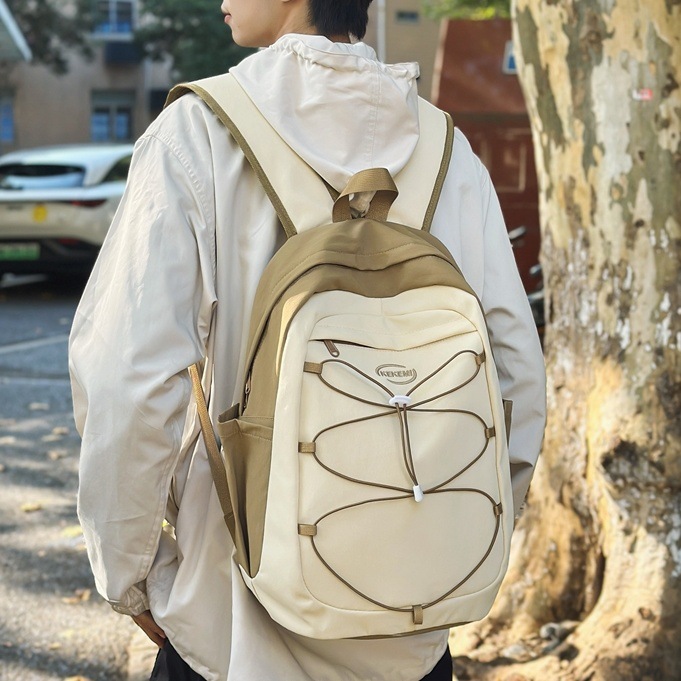 Men's Japanese-style casual and versatile large-capacity travel backpack, light and simple schoolbag for junior high school, senior high school and college students, women full figure