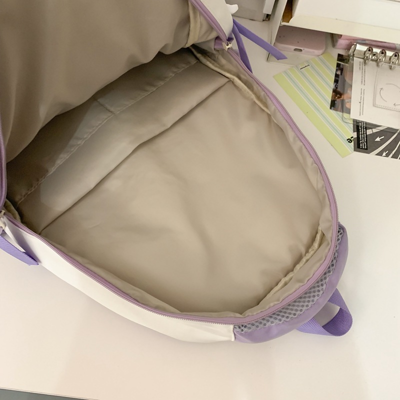 A cute schoolbag for junior high school students, a lightweight forest-themed versatile bag with contrasting colors, and a large-capacity backpack for high school students Application Scenario