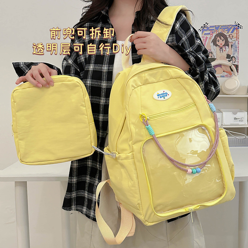Cute primary school student backpacks, transparent schoolbags with a college style, solid-color smudged pain bags, simple and niche backpacks for junior and senior high school students full figure