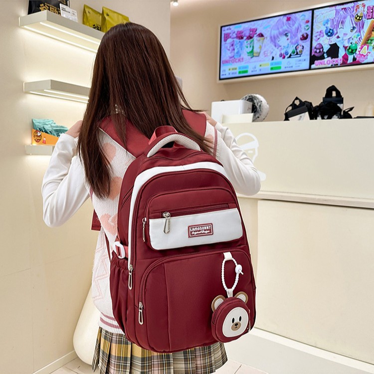 The new schoolbag for primary school girls is cute and fresh, with a light burden and back support. It is also a lightweight and large-capacity backpack for junior high school students full figure