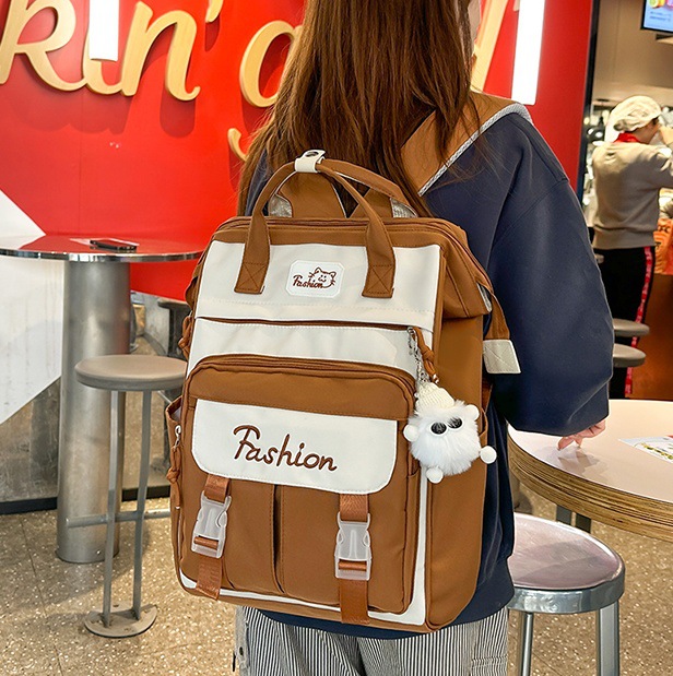 A large-capacity schoolbag with a school style for girls, a new American-style student niche schoolbag for commuting and leisure travel in 2025 full figure