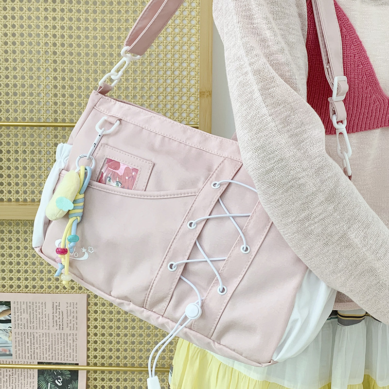 College-style versatile, simple and large-capacity postman schoolbag, women's clothing book, transparent shoulder bag, casual pain bag full figure