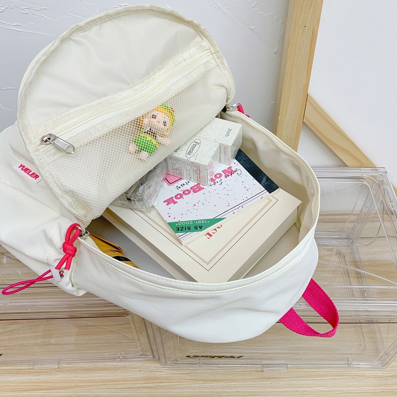 The new Korean-style ins high-appearance-level fresh and sweet letter backpack is a lightweight and large-capacity backpack for junior and senior high school students Application Scenario