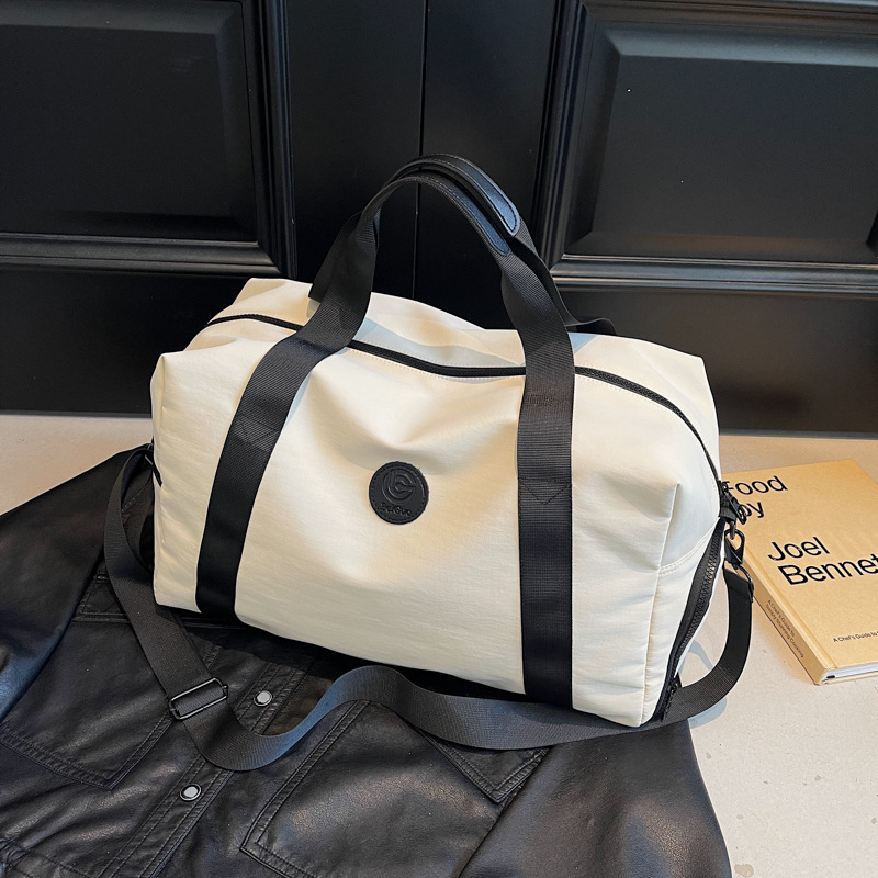 Travel bag, women's short-distance large-capacity luggage bag, fitness bag, men's fashionable handbag, casual commuting, crossbody storage details Picture