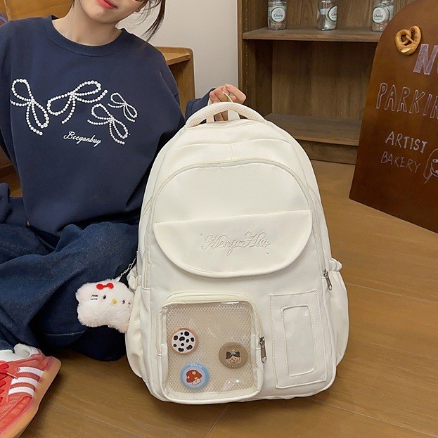 High-appearance-level Korean InS-style solid-color backpacks for junior and senior high school students, large-capacity transparent smudged pain bags for girls full figure