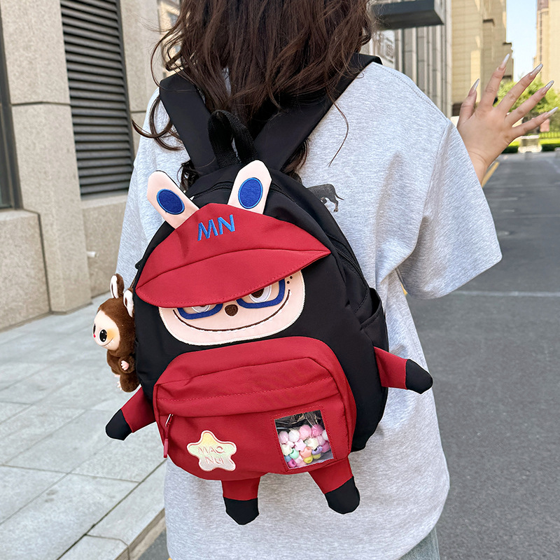 New high-appeartion-level cute cartoon doll schoolbag for kindergarten and primary school students, casual, simple and lightweight commuting backpack full figure