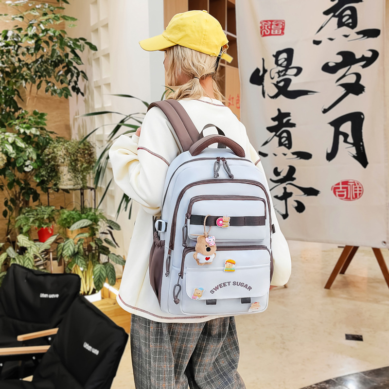 Cute and soft, large-capacity schoolbag for primary school students from grades three to six, lightweight, lightweight, versatile, casual and sweet backpack full figure