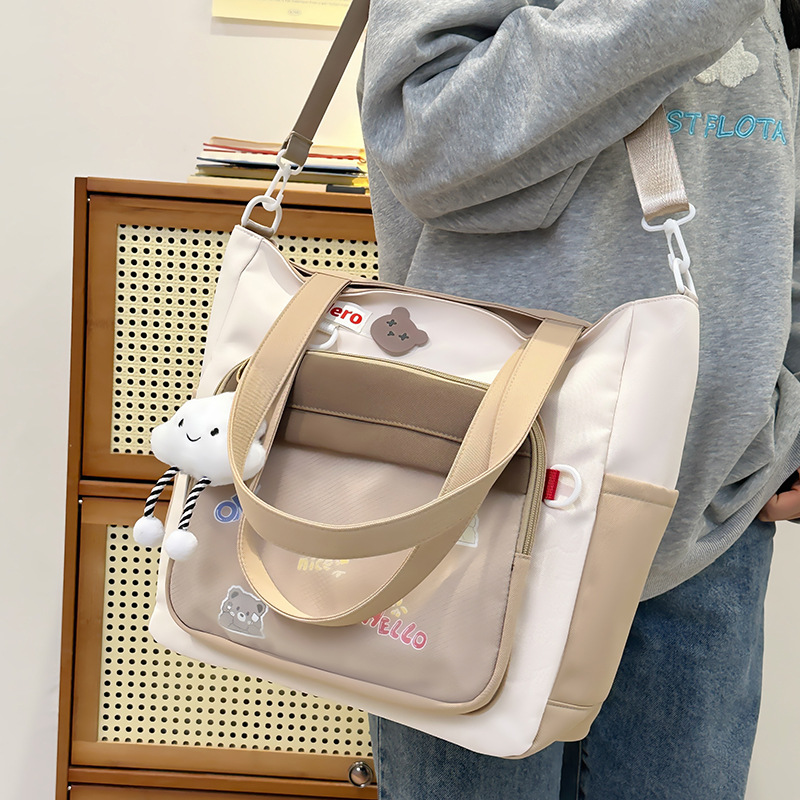 2025 New Korean version large-capacity tutorial bag, primary school single-shoulder bag, handbag, tutorial bag, crossbody art schoolbag full figure