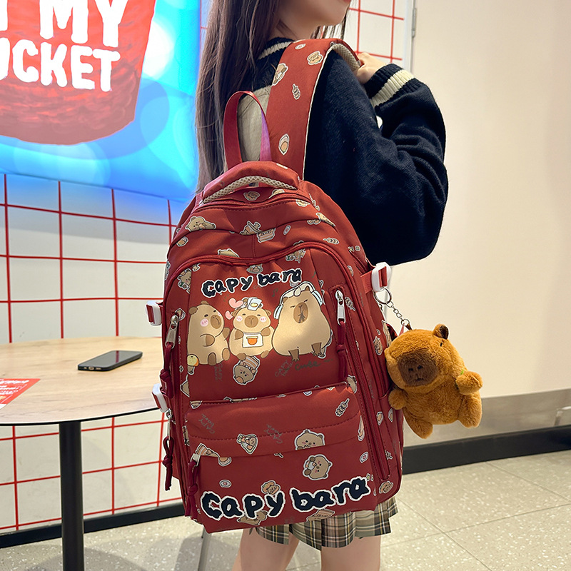 New cute, ugly and adorable cartoon printed backpack for primary and secondary school students in grades 3 to 6, high appearance level, fresh and clean backpack for girls details Picture