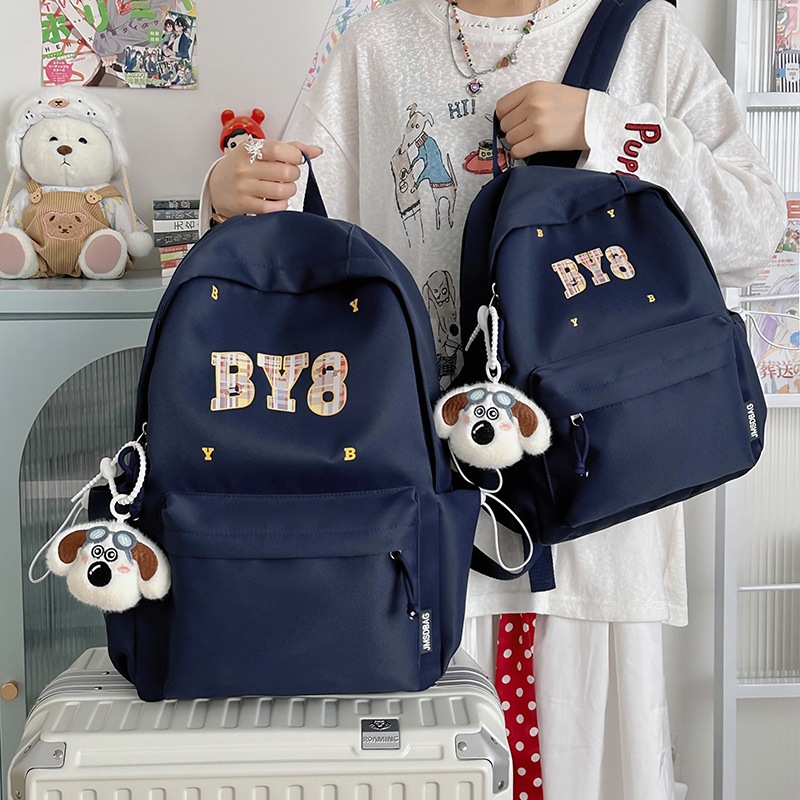 A new high-appearance-level letter-style backpack for couples in a solid color, casual, simple, lightweight and large-capacity backpack from the Korean version of Instagram details Picture